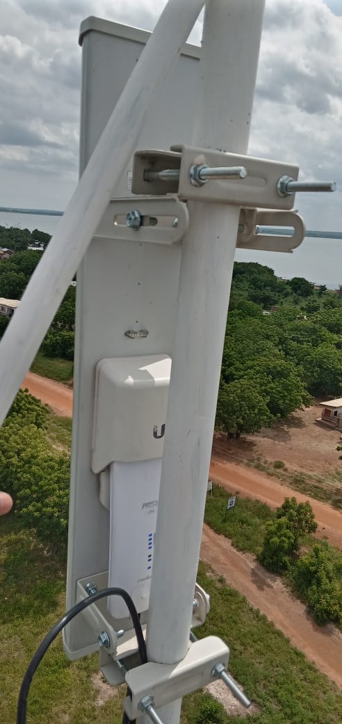 Close-up of a sector antenna at the top of the tower